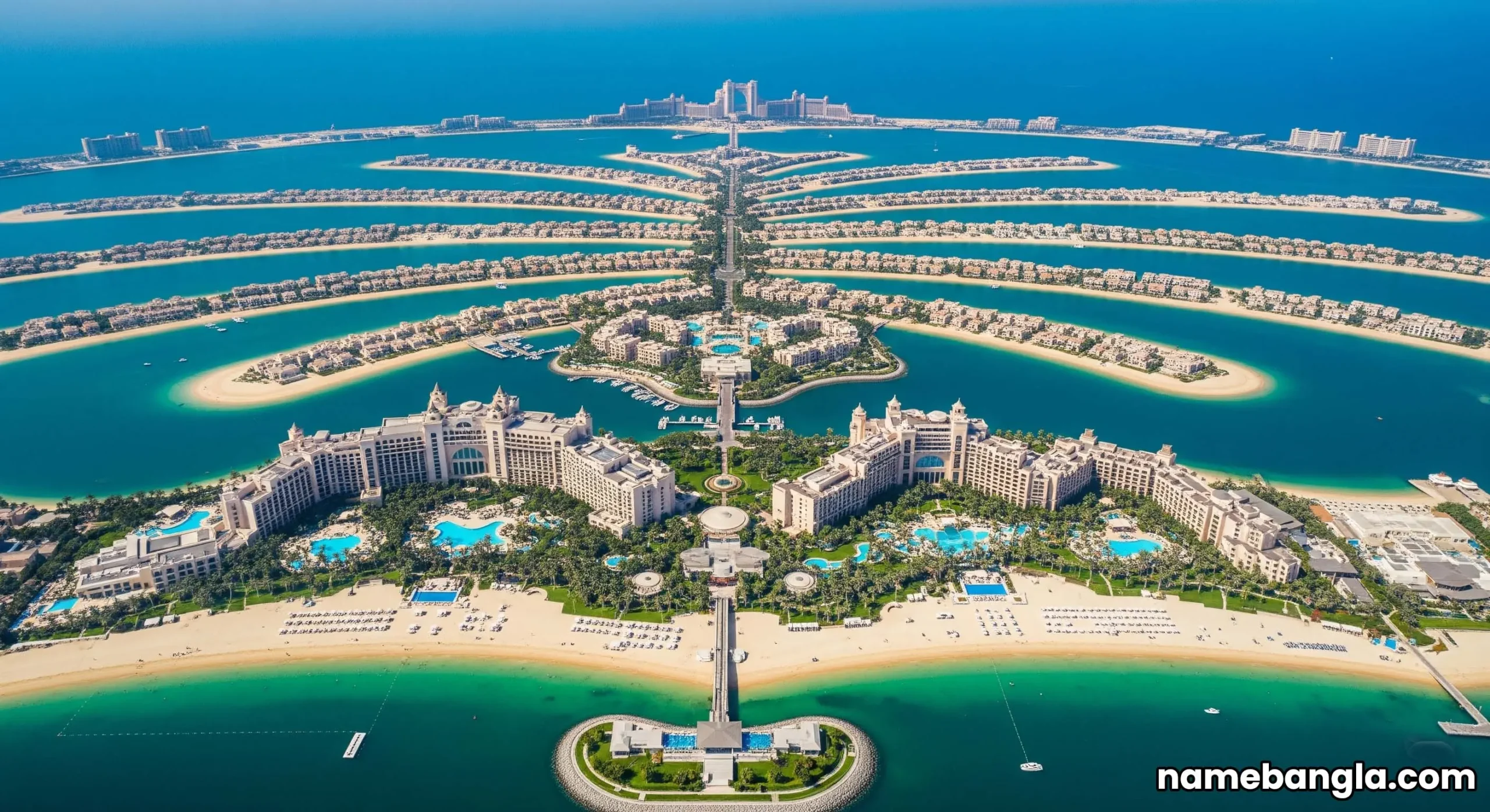 Aerial view of Palm Jumeirah with sprawling luxury resorts, showing Dubai's exclusive landscape.