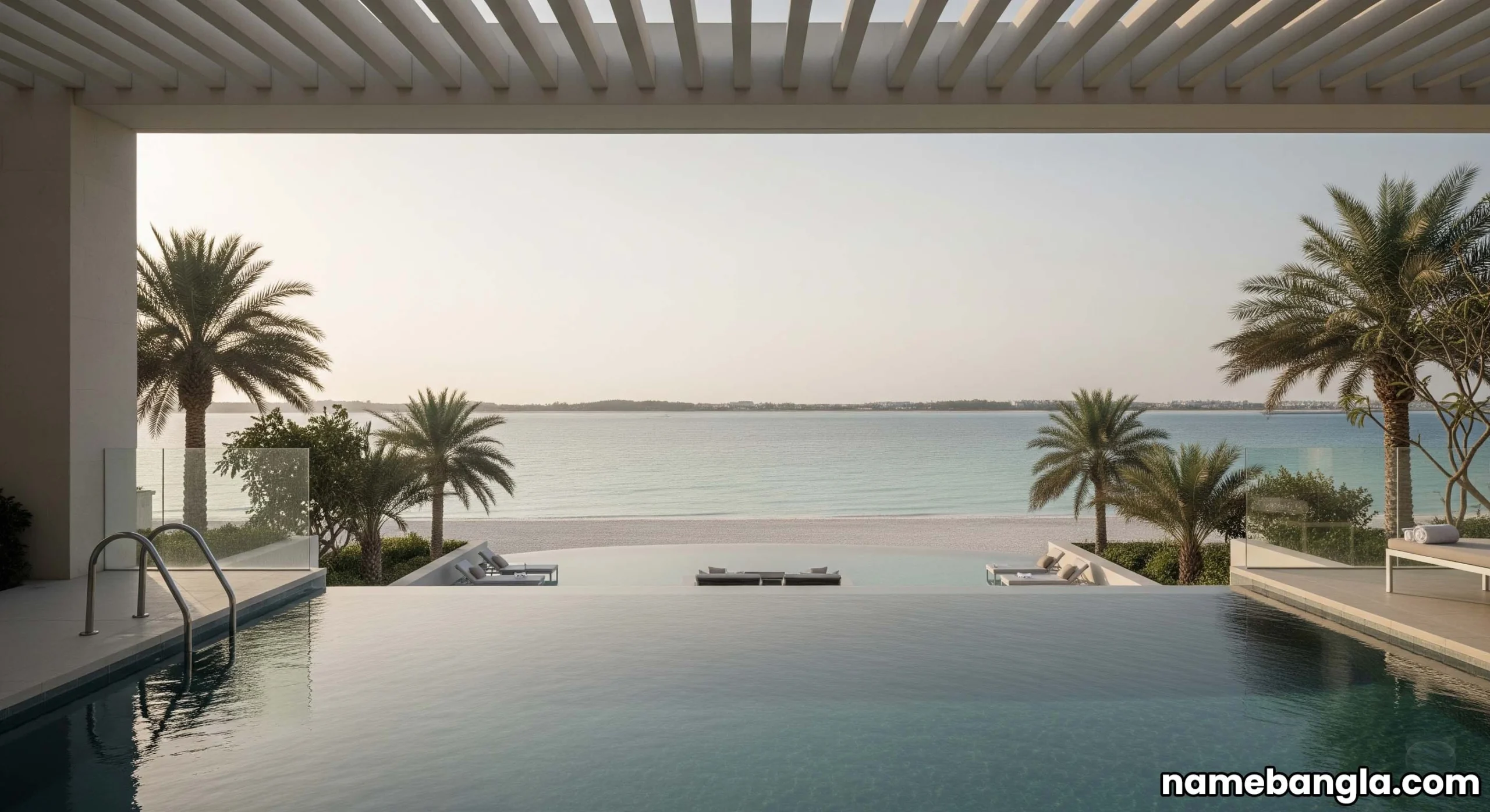 Infinity pool of a high-end Abu Dhabi penthouse overlooking a pristine private beach on Saadiyat Island.
