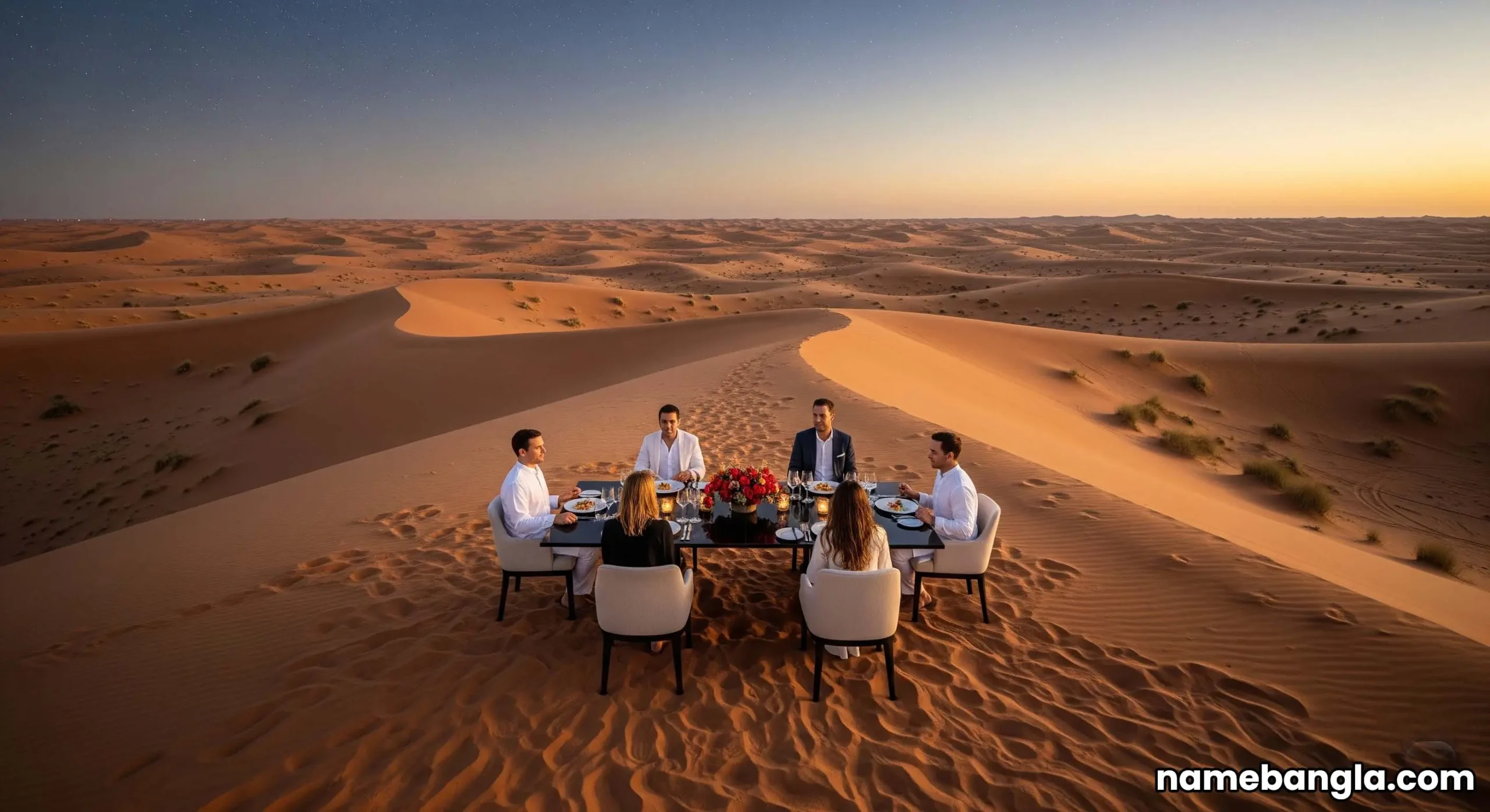 Private dining experience in a golden desert dune, representing bespoke UAE tourism.