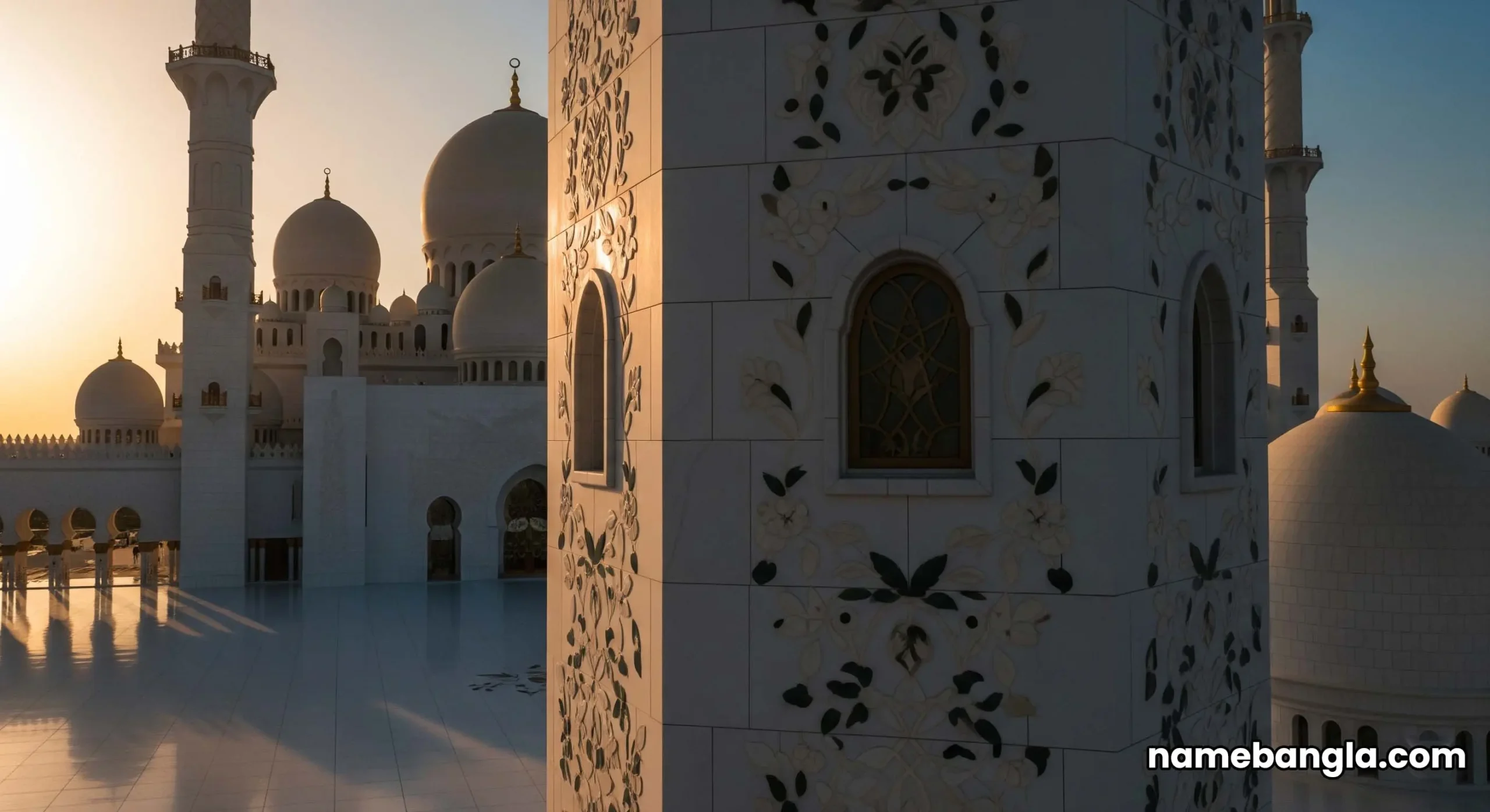 A breathtaking aerial view of the Sheikh Zayed Grand Mosque in Abu Dhabi, glowing in the warm light of the golden hour.