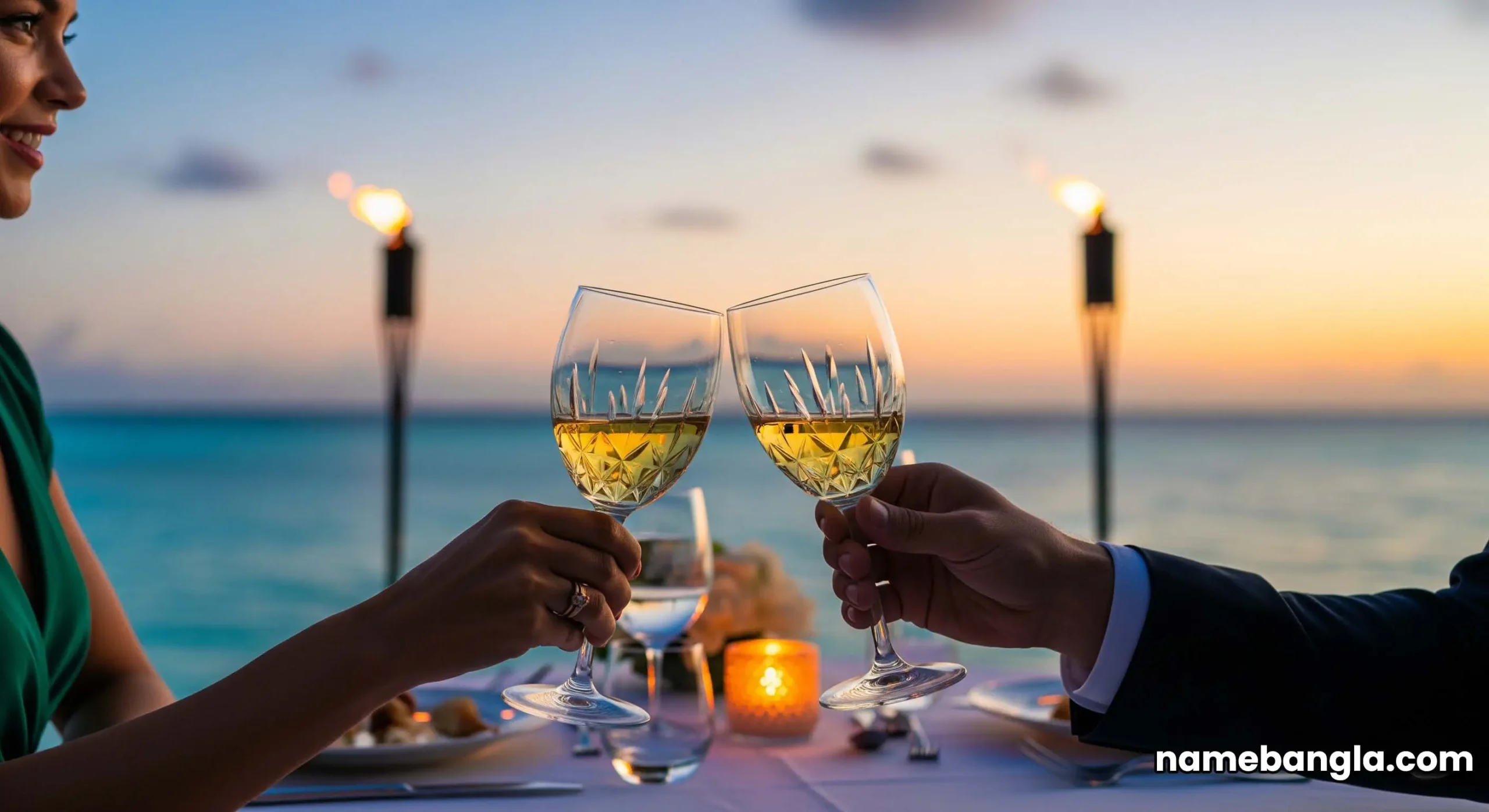 A romantic private dining setup on a beach in Abu Dhabi, with a beautifully set table and sunset views.