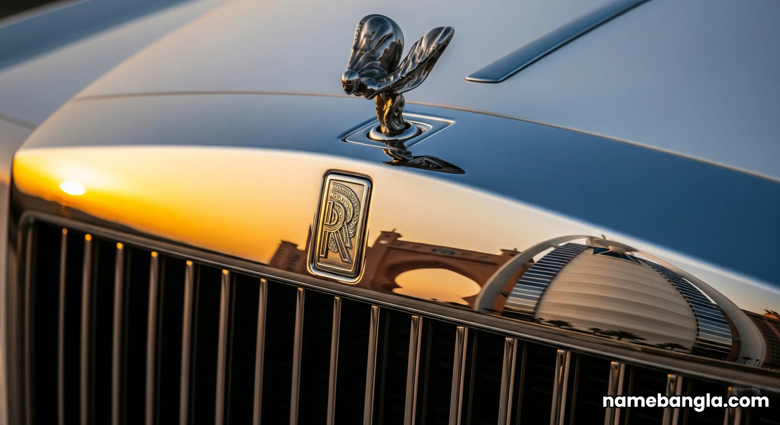 A signature white Rolls-Royce Phantom waiting for a guest at the entrance of the Burj Al Arab hotel.