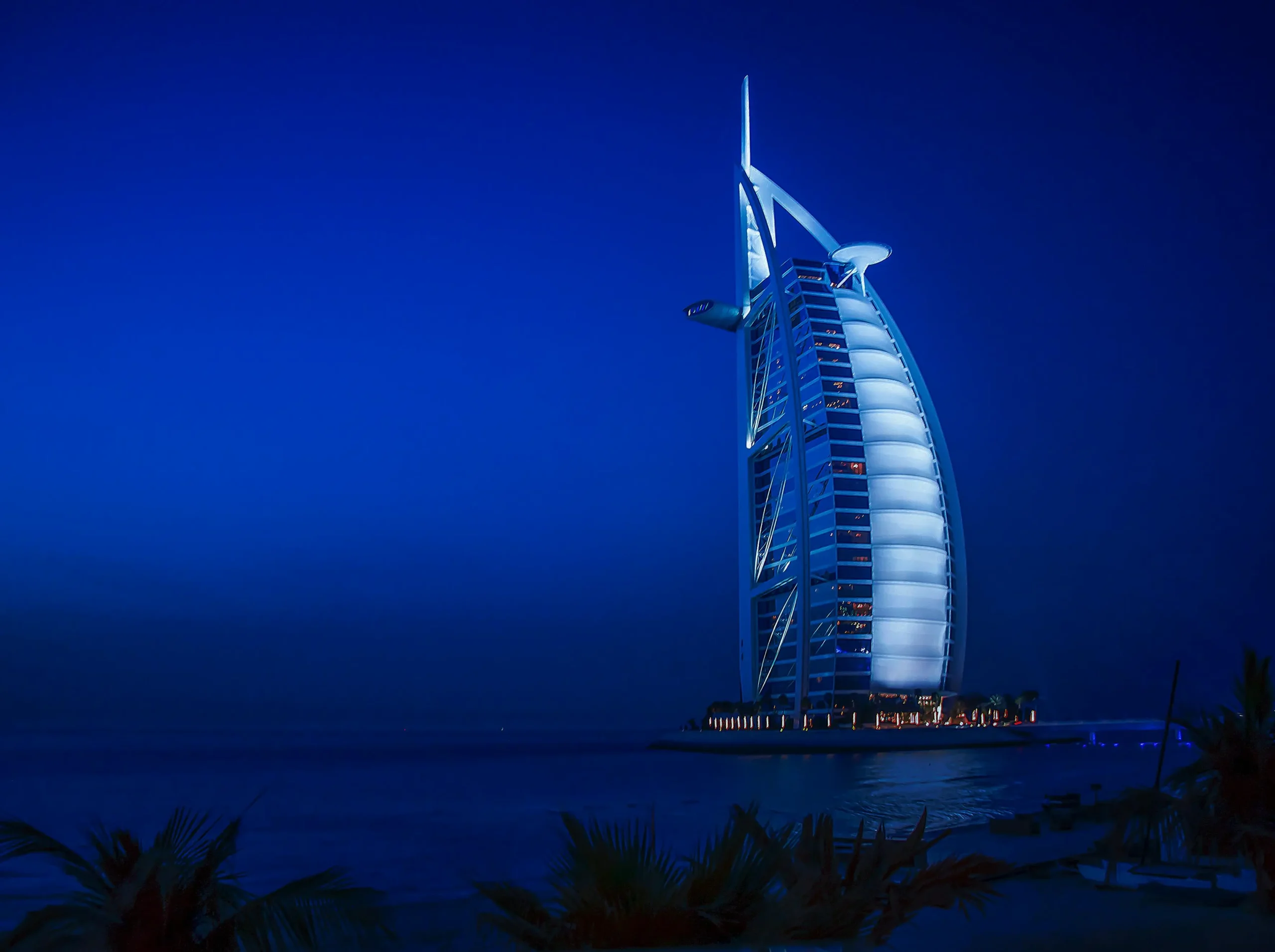 The iconic sail-shaped exterior of the Burj Al Arab Jumeirah in Dubai.