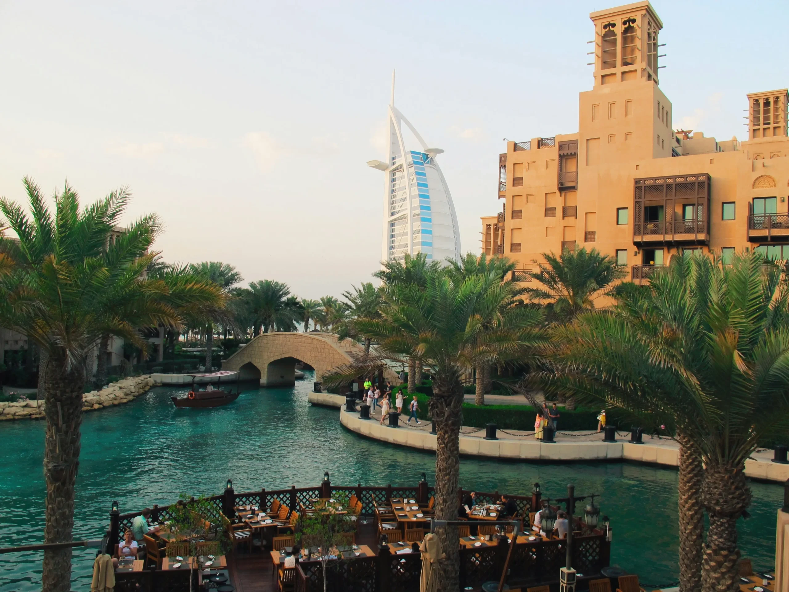 An aerial view of The Terrace at Burj Al Arab, a luxury pool deck extending into the sea.