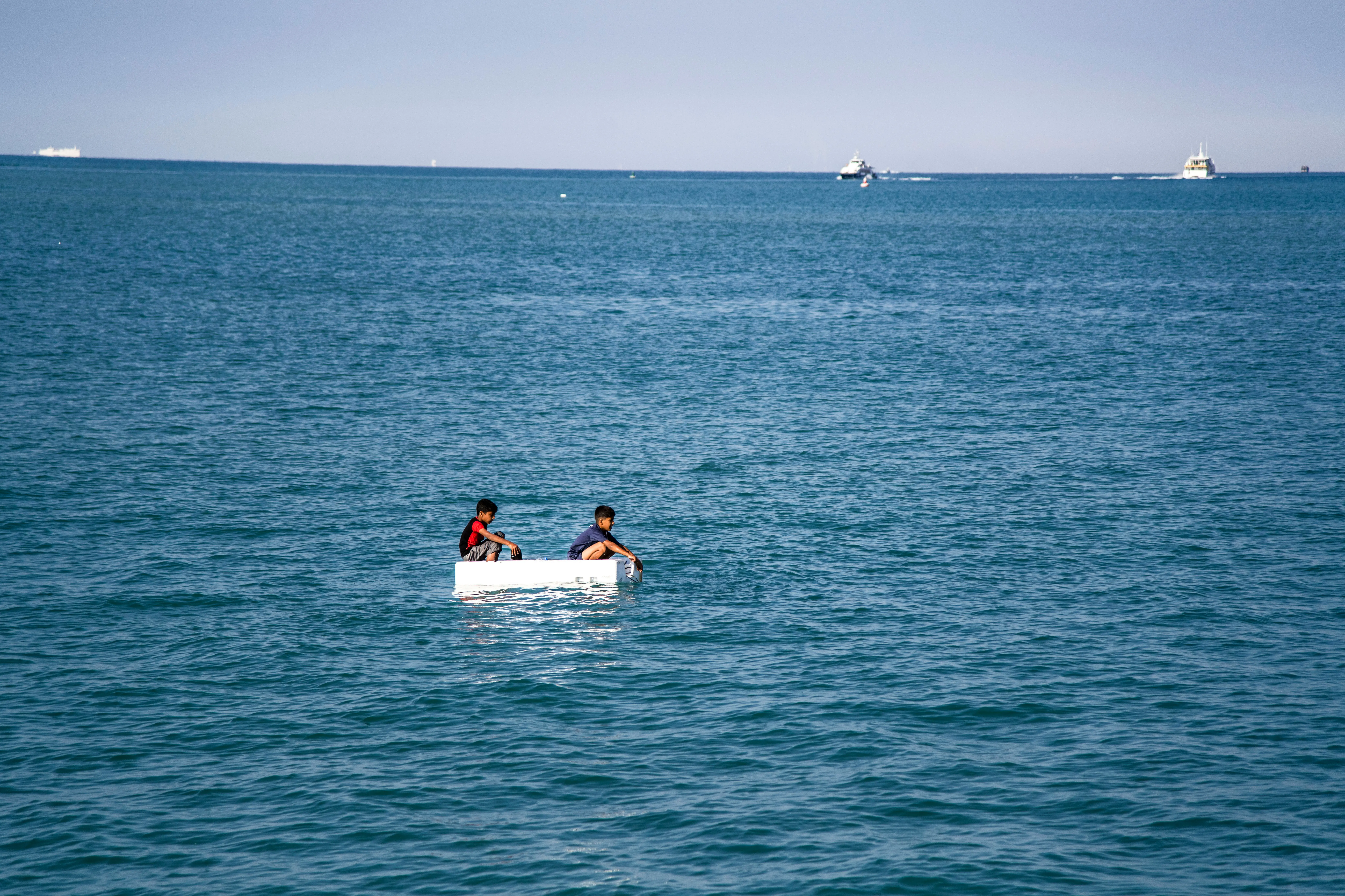 The edge of the saltwater infinity pool at The Terrace at Burj Al Arab, overlooking the sea.