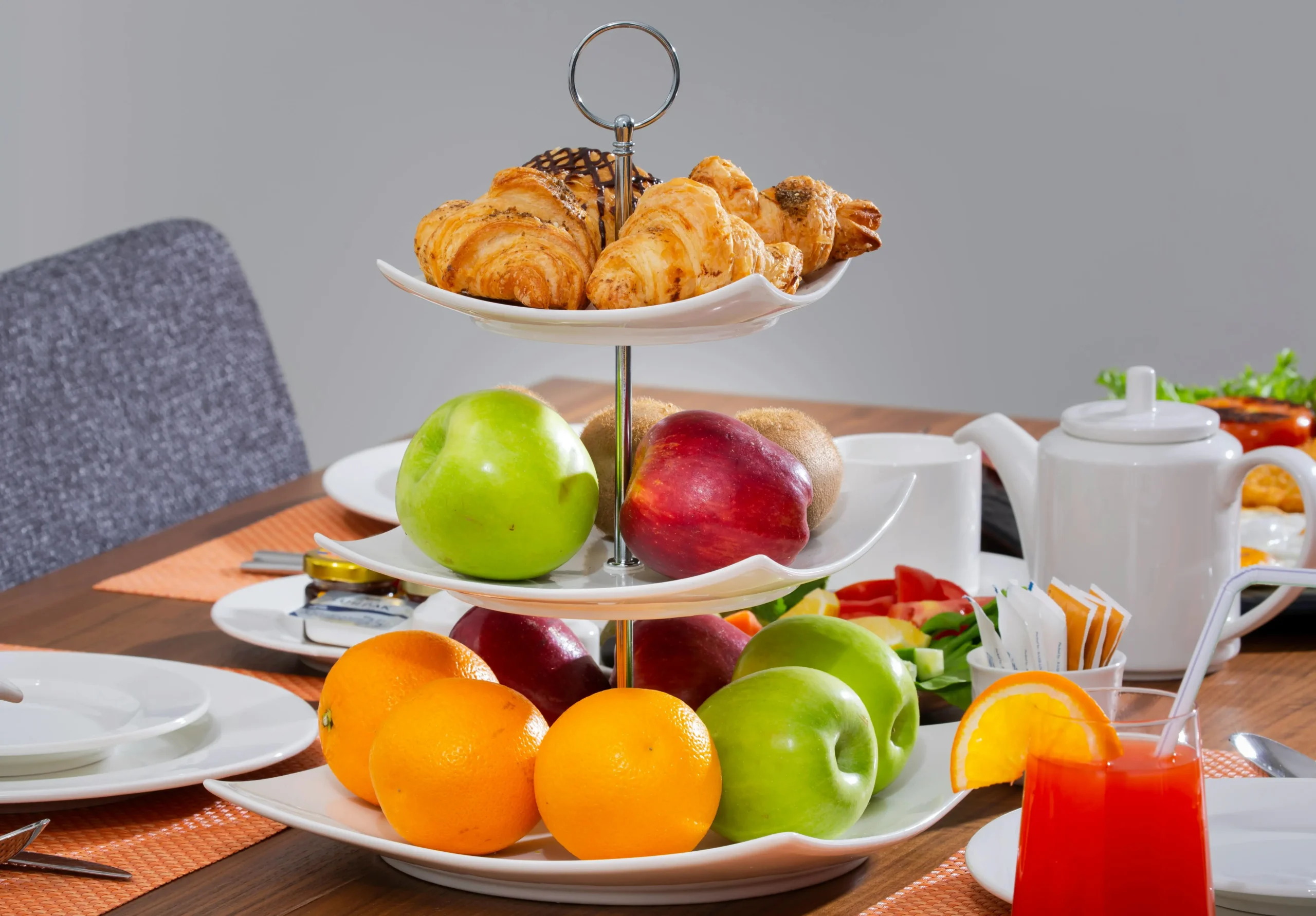 The seven-course afternoon tea menu at Sahn Eddar, featuring pastries and scones.