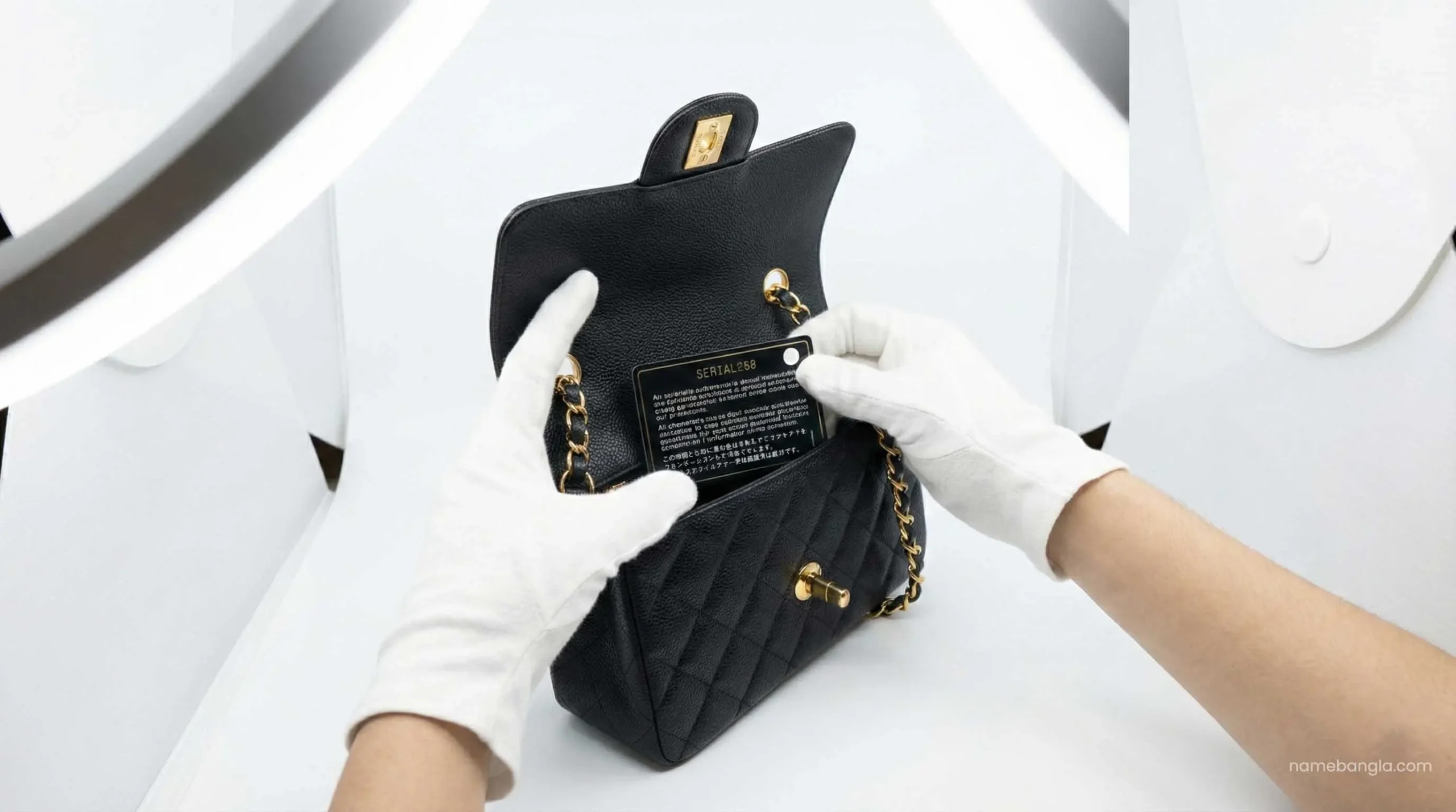Inspecting authentic Chanel bag serial number and quality.