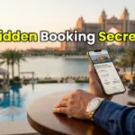 A luxurious traveler unlocking premium Agoda VIP platinum deals for Atlantis The Palm Dubai on a high-end smartphone.