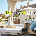 High-net-worth individuals enjoying a luxurious private cabana at Aquaventure Waterpark, representing a premium Atlantis VIP day pass.