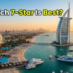 A breathtaking aerial view comparing the wave-shaped Jumeirah Beach Hotel with the sail-shaped Burj Al Arab in Dubai.